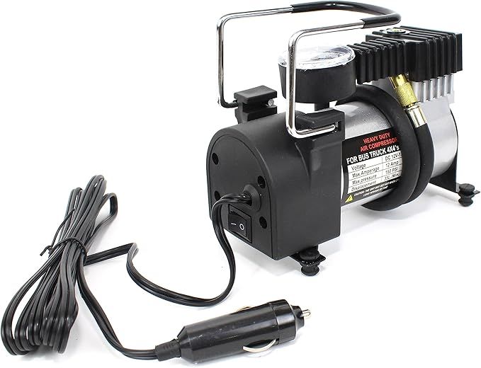 Car air compressor with power cord on a white background