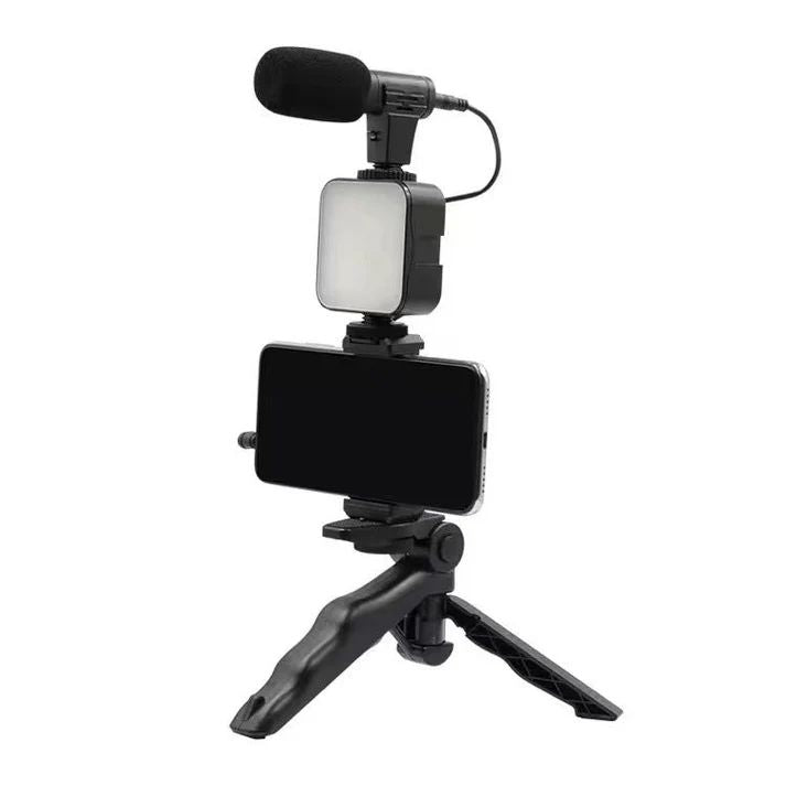 Phone holder with microphone and light on a white background