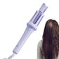 Purple hair curler with a person using it on a white background