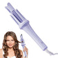Woman with styled hair holding a purple hair styling tool on a white background