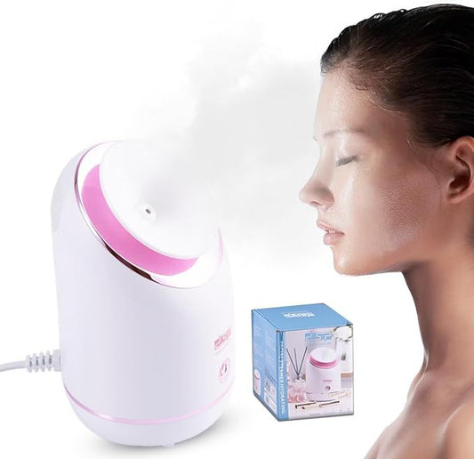 Beauty device with pink light and packaging on a white background